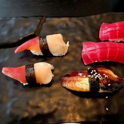 Ye's Sushi - Nigiri surf clam was great and tender. The tuna was good and nice and cold. The eel was standard. Again they need better rice.