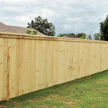 Victor’s Lawnscape - a wooden fence - Lawn Services Near Me Victor’s Lawnscape - a wooden fence - Lawn Services Near Me