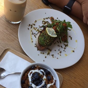 Rose Park Coffee Roasters - Avocado toast, iced latte, and granola Organic yogurt Blueberries and honey - Coffee & Tea Near Me - Long Beach, California