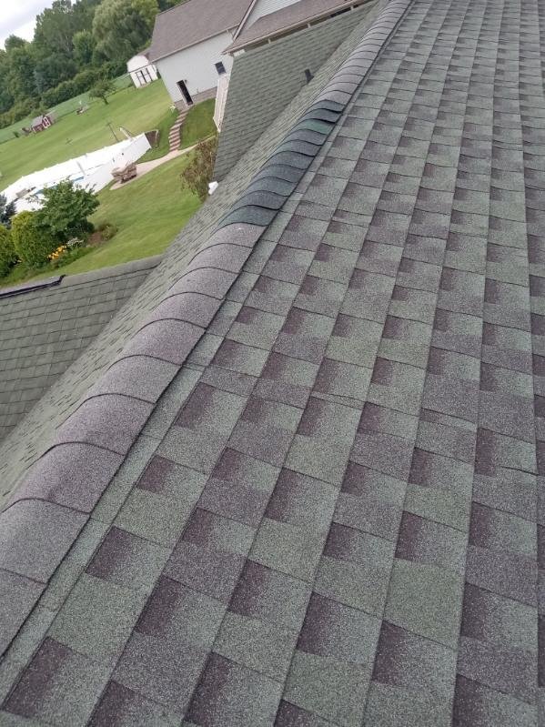 Slide of All Slopes Roofing