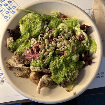 Little Beet - a bowl of broccoli salad on a table - Salad Near Me - Washington, DC, District of Columbia