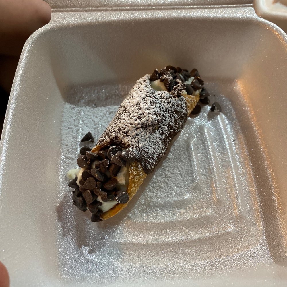 a dessert in a styrofoam container