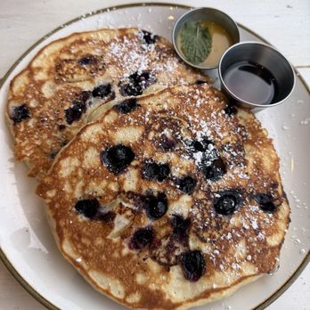 Monkeypod Kitchen - Blueberry a lilikoi pancakes for breakfast. - Tacos Near Me - Honolulu, Hawaii Monkeypod Kitchen - Blueberry a lilikoi pancakes for breakfast. - Tacos Near Me - Honolulu, Hawaii
