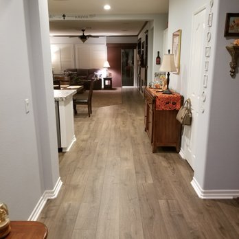 Ford Flooring - a view of a living room and dining room - Flooring Near Me