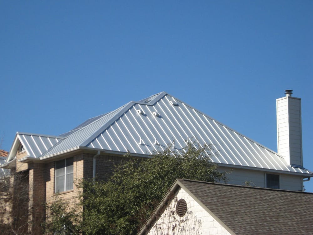 Slide of Travis Roofing Austin