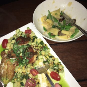 The Lark - Seared scallop appetizer and pappardelle in the back - New American Near Me - Santa Barbara, California