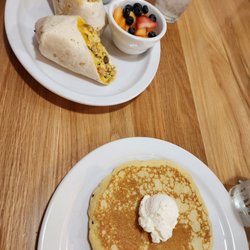 Big Bad Breakfast - Nashville - Had a taste for sweet, so we also ordered 1 pancake to share. The breakfast burrito is stuffed with protein.