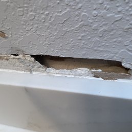hole in wall because splashbacks were not measured correctly