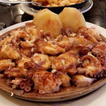 Spanish Pavillion Restaurant - Octopus appetizer as a dinner portion - garlic, olive oil, sea salt, paprika, and potatoes. AMAZING. - Seafood Near Me - Harrison, New Jersey