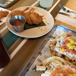 Coconut shrimp and fish tacos