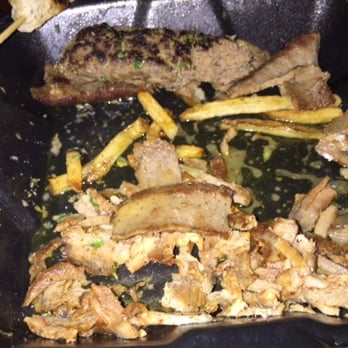 Opa! Mezze Grill - SLOP! Nice half inch of grease covering the entire bottom of his takeout container. WHO SERVES FOOD LIKE THIS! - Greek Near Me - Ashburn, Virginia