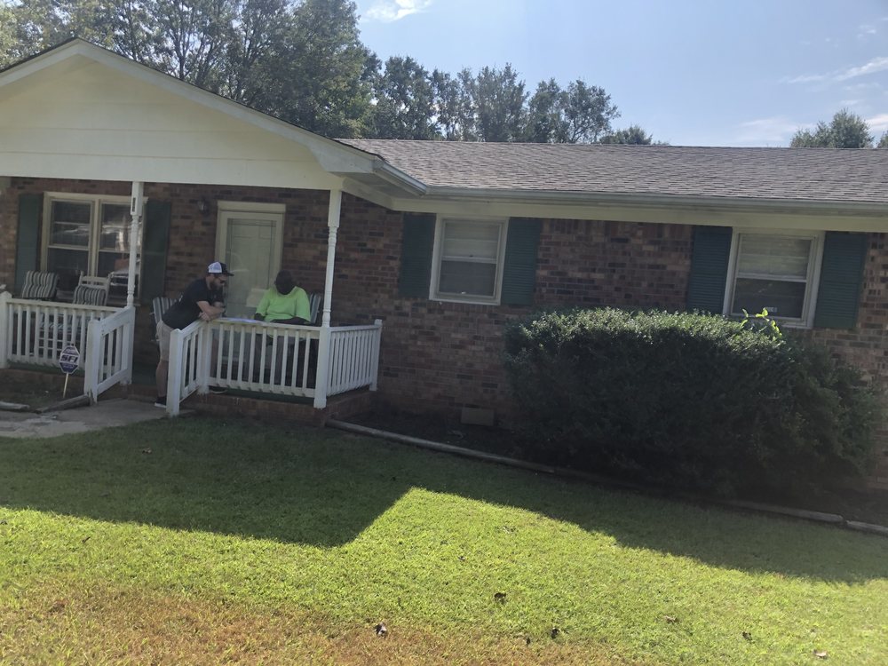 Slide of Roebuck Roofing