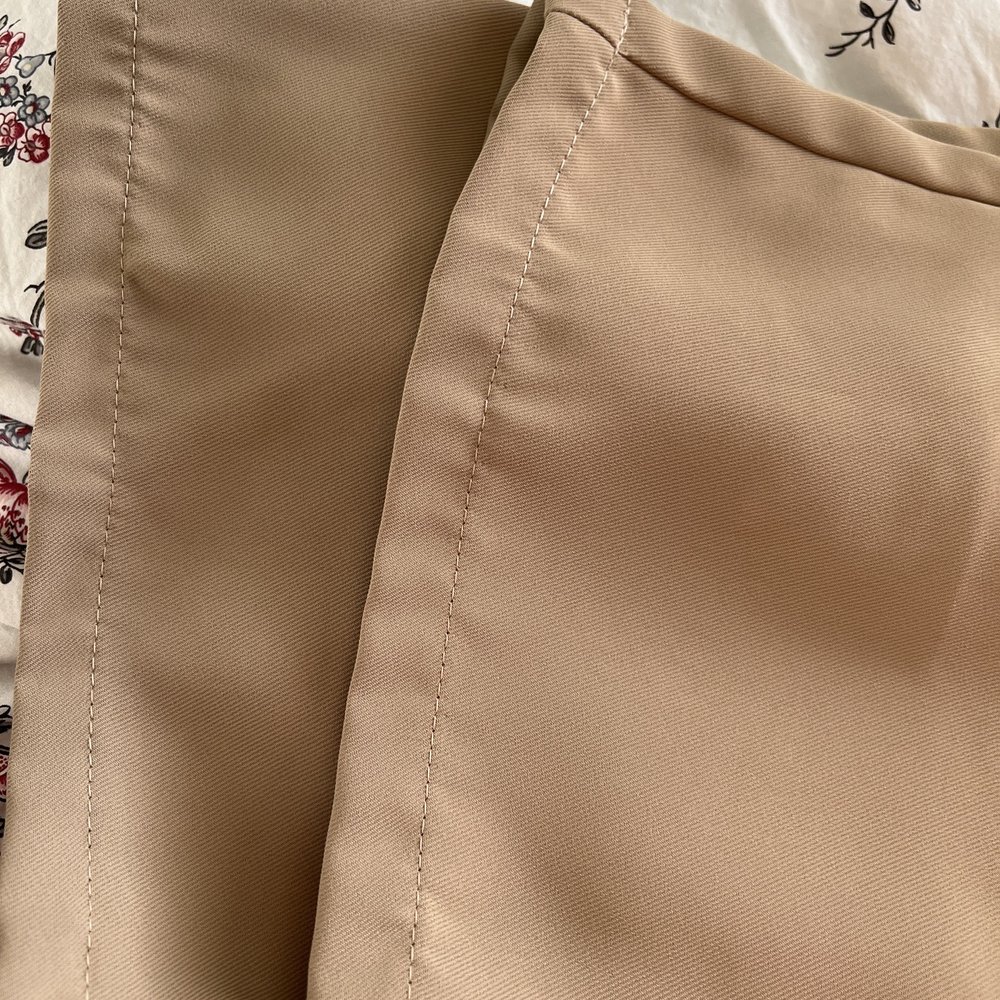 Badly wrinkled hem Badly wrinkled hem