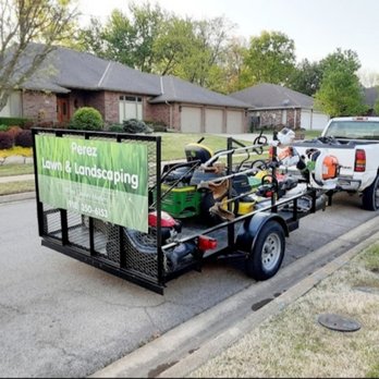 Perez Lawn & Landscaping - a truck pulling a trailer loaded with equipment - Lawn Services Near Me Perez Lawn & Landscaping - a truck pulling a trailer loaded with equipment - Lawn Services Near Me
