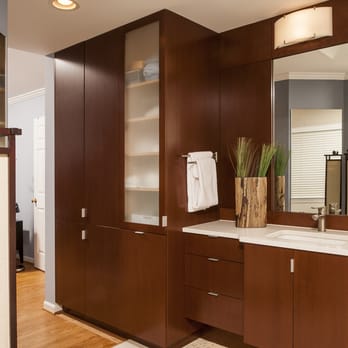 MJA Design - a bathroom with a large mirror - Cabinetry Near Me - Manassas, Virginia