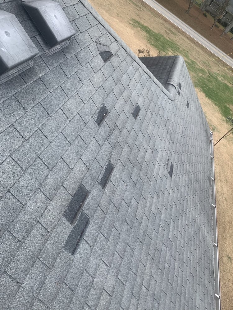 Slide of Noland Roofing