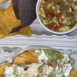 Guacamole medium size and chicken Flautas Guacamole medium size and chicken Flautas