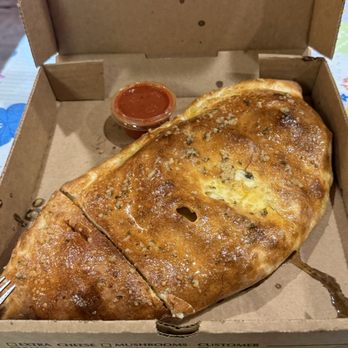 Rosario's Deli - A calzone for less than $15 that can easily feed two hungry adults. - Delis Near Me - Massena, New York Rosario's Deli - A calzone for less than $15 that can easily feed two hungry adults. - Delis Near Me - Massena, New York