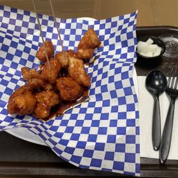 a tray of food with a fork and spoon a tray of food with a fork and spoon