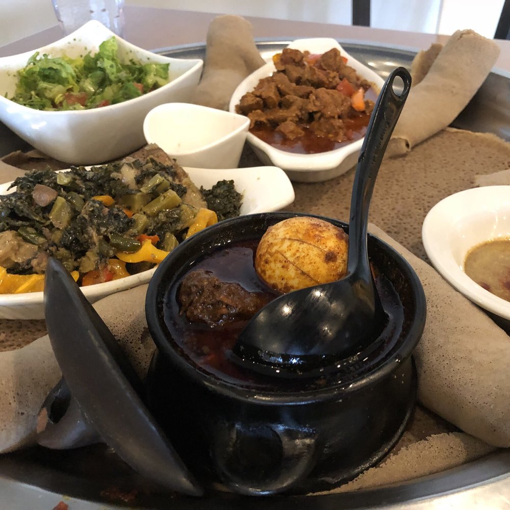 a variety of dishes on a tray