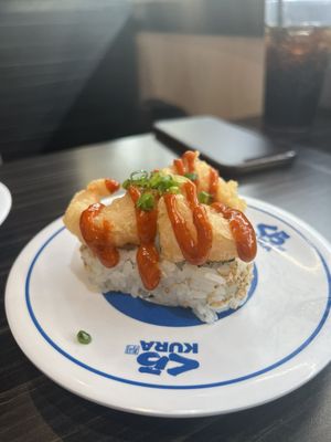 Kura Revolving Sushi Bar by null