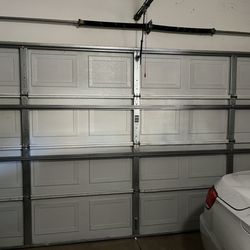 Next Door Overhead Doors - Repaired door... added 2 braces for support.