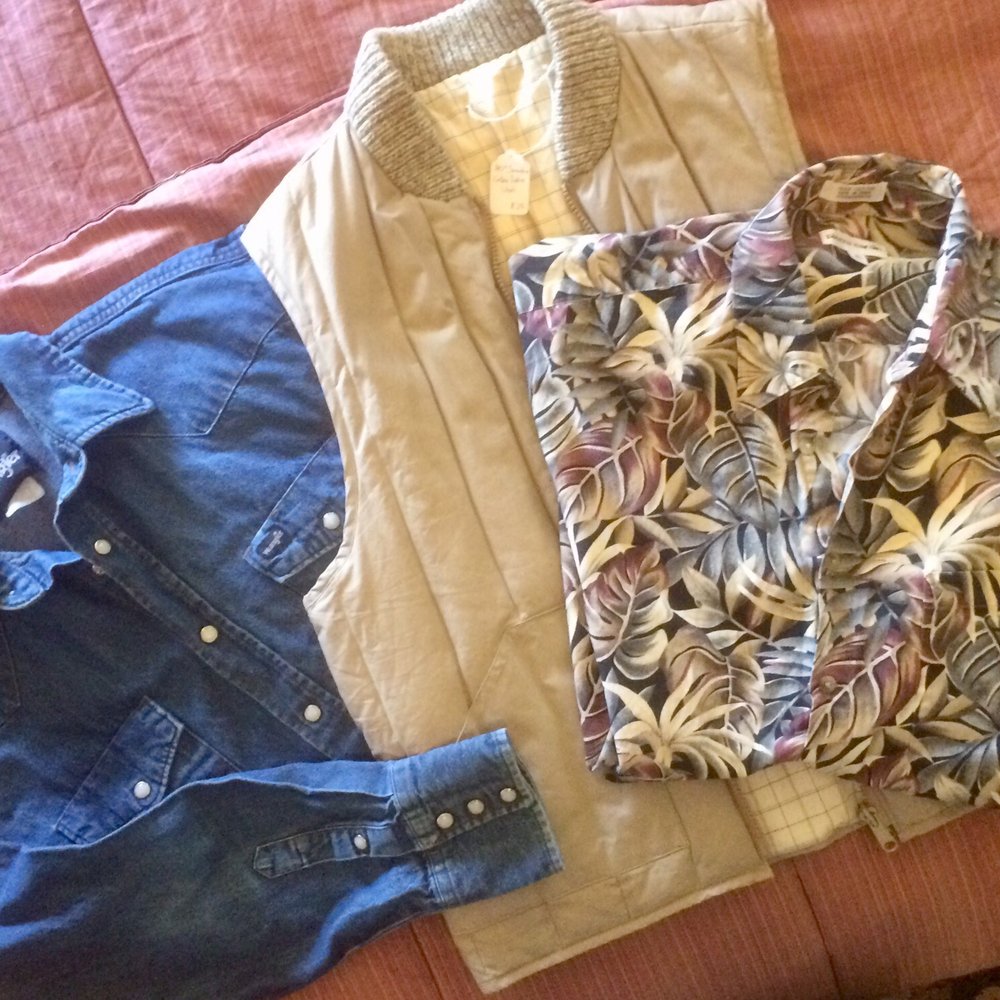 Keepers Vintage - (l. to r.) Wrangler jean shirt, tan puffy 80s vest and Hawaiian Pierre Cardin shirt - Used, Vintage & Consignment Near Me - Baltimore, Maryland Keepers Vintage - (l. to r.) Wrangler jean shirt, tan puffy 80s vest and Hawaiian Pierre Cardin shirt - Used, Vintage & Consignment Near Me - Baltimore, Maryland