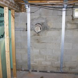 Northern Basement Systems - Basement Wall Repair and Reinforcement with Power Braces.