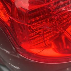 Boucher's Auto Body - Broken tail light before