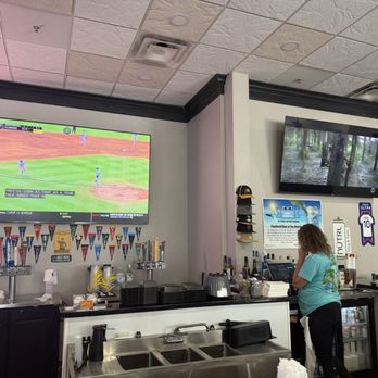 Seven Grill - Several TV's! I counted 9 inside. - Sports Bars Near Me - Port Charlotte, Florida