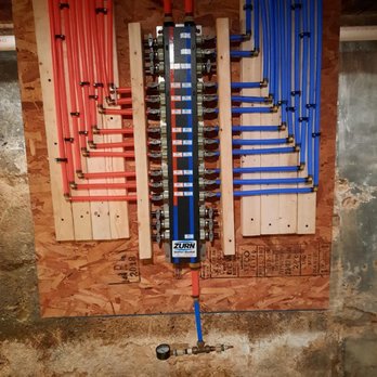 Holiday Enterprises - an electrical panel in a basement - General Contractors Near Me - Sunbury, Pennsylvania Holiday Enterprises - an electrical panel in a basement - General Contractors Near Me - Sunbury, Pennsylvania