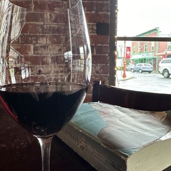 Vino Bella - A book and good glass of wine. - Wine Bars Near Me - Issaquah, Washington