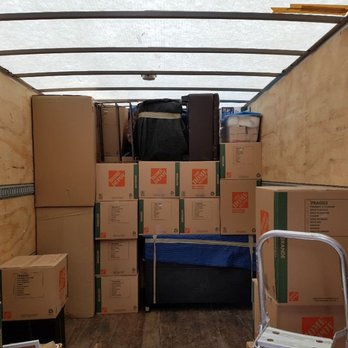 C C Enterprise - Middle of loading a shipment. - Movers Near Me