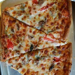 Indian Mound House Of Pizza - Six mushrooms, five tomato slivers, no spinach, $6.00