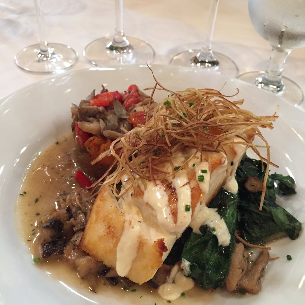 Napa Valley Catering - Alaskan Halibut with maitake mushroom jus served with a vegetable tower of eggplant, butternut squash, peppers, maitake mushrooms and sautée - Caterers Near Me - Napa, California