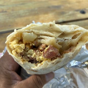 Aspen Grill - Bacon breakfast burrito with potatoes, eggs and cheese. - Breakfast & Brunch Near Me - Mammoth Lakes, California Aspen Grill - Bacon breakfast burrito with potatoes, eggs and cheese. - Breakfast & Brunch Near Me - Mammoth Lakes, California