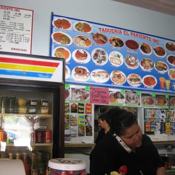 Taqueria El Pariente - a woman sitting at a counter - Mexican Near Me - Newhall, California