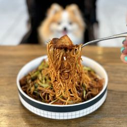 Pork Chow Mein w/ onions, sprouted beans, broccoli, crunchy snap peas | $21