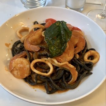 Misirizzi - Black Linguine, Poached White Shrimps, Squid, Clams, Lobster Broth - Italian Near Me - New York, New York Misirizzi - Black Linguine, Poached White Shrimps, Squid, Clams, Lobster Broth - Italian Near Me - New York, New York