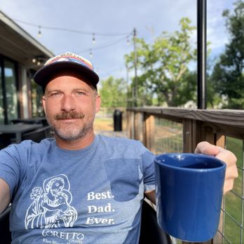 Airship Coffee - lovely side porch overlooking a beautiful tree with loads of squirrels! - Coffee Roasteries Near Me - Bentonville, Arkansas Airship Coffee - lovely side porch overlooking a beautiful tree with loads of squirrels! - Coffee Roasteries Near Me - Bentonville, Arkansas