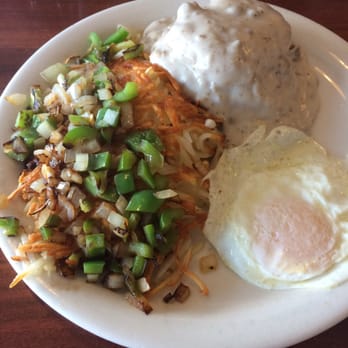 Pop's Cafe - Pop's breakfast with Irish potatoes, an over easy egg, and biscuits and gravy with a meat patty in the middle. - Breakfast & Brunch Near Me - Downey, California Pop's Cafe - Pop's breakfast with Irish potatoes, an over easy egg, and biscuits and gravy with a meat patty in the middle. - Breakfast & Brunch Near Me - Downey, California