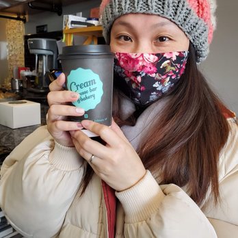 Cream Espresso Bar and Bakery - Latte! Wife posing with the late in their cute little shop. - Bakeries Near Me - North Bellmore, New York Cream Espresso Bar and Bakery - Latte! Wife posing with the late in their cute little shop. - Bakeries Near Me - North Bellmore, New York