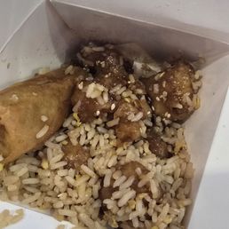 Waitress packed our to-go left overs which are eggroll, sesame chicken and fried rice. This is the to-go box all crammed in..smh Waitress packed our to-go left overs which are eggroll, sesame chicken and fried rice. This is the to-go box all crammed in..smh