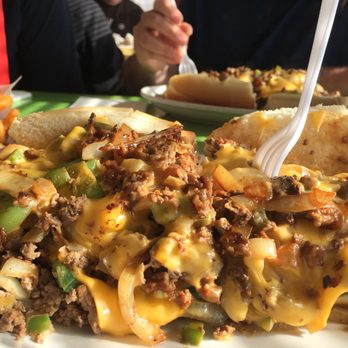 Hoagie Hut - a plate of food with a fork in it - Sandwiches Near Me - Colchester, Vermont