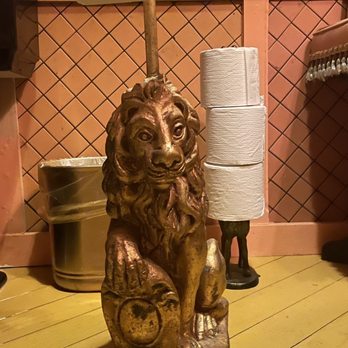 HiLot - a lion toilet paper holder with a roll of toilet paper - Cocktail Bars Near Me - New York, New York