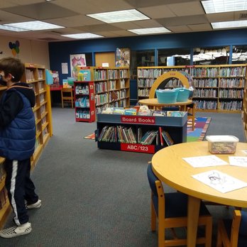 Eggertsville-Snyder Branch Library - Grabbing some festive DVDs. :-) - Libraries Near Me - Snyder, New York