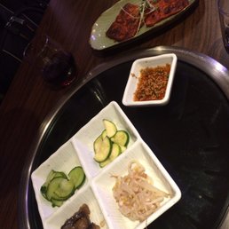 Pickles vegetables and dipping sauce with kimchi pancake