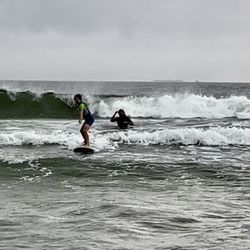 Lucky Dog Surf Co - My son taking his first wave in a private lesson with Jason