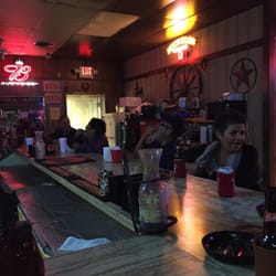 Jim's Rodeo Tavern - Customers having a few cold ones at the bar!