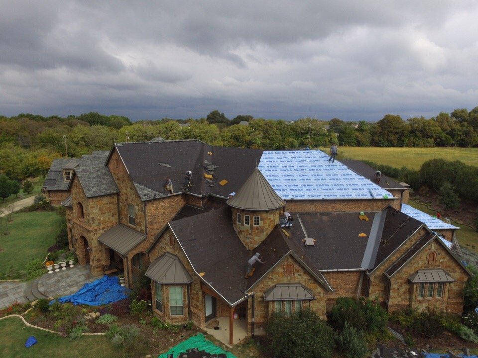 Slide of Axis Roofing